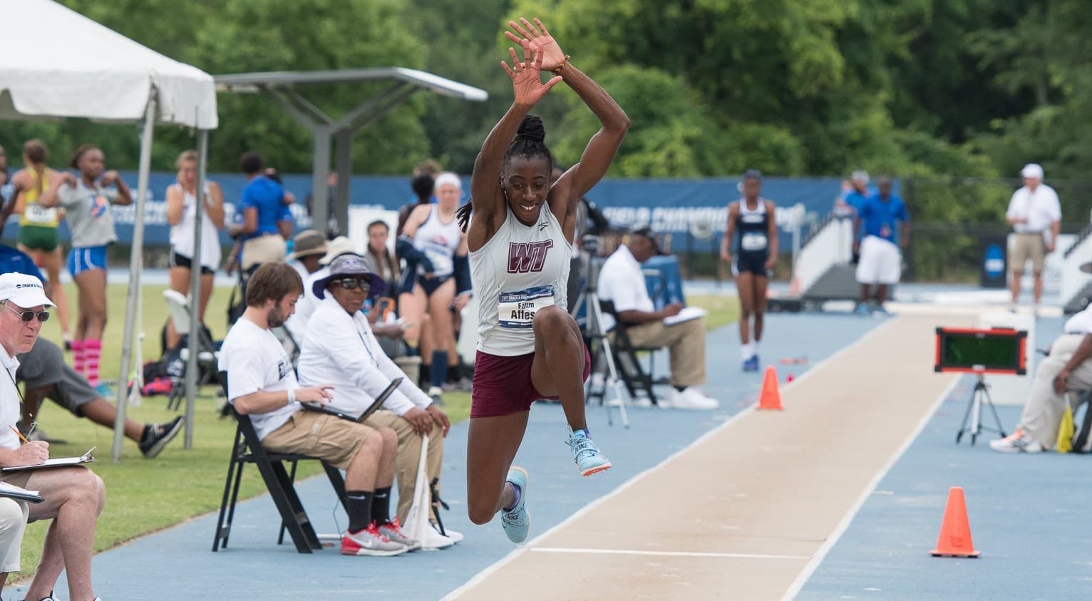 Fatim Affessi jumping for West Texas A&M